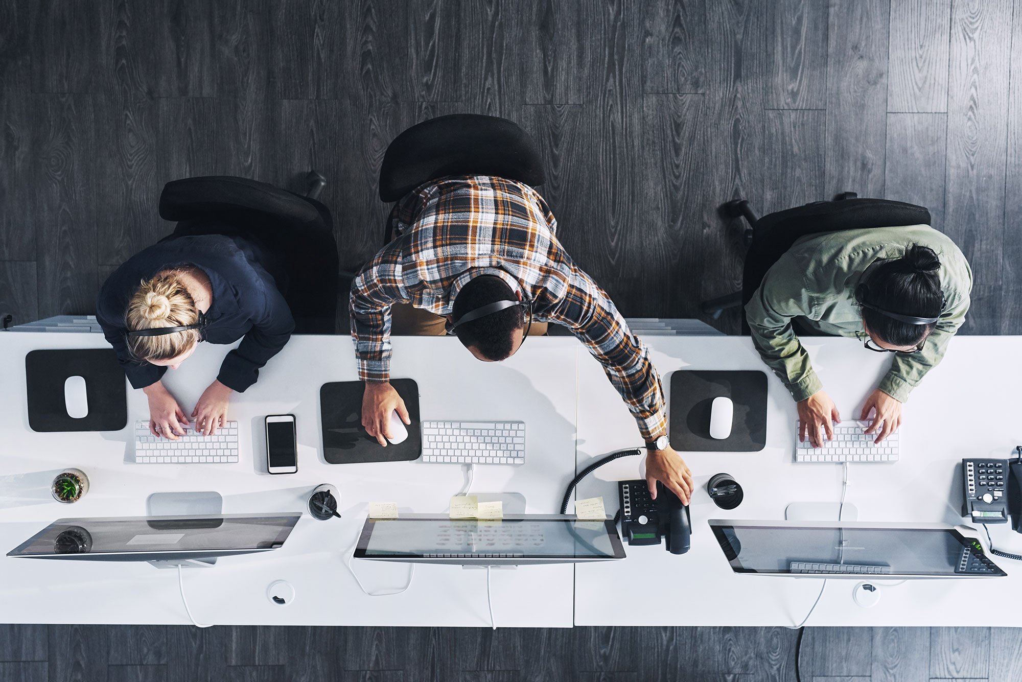 business-call-center-overhead-phones-headsets-computers