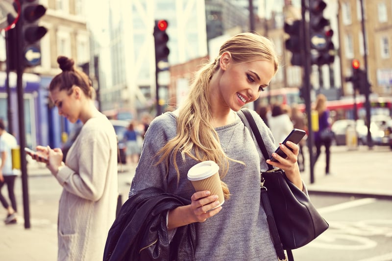women-in-city-street-using-smartphones.jpg
