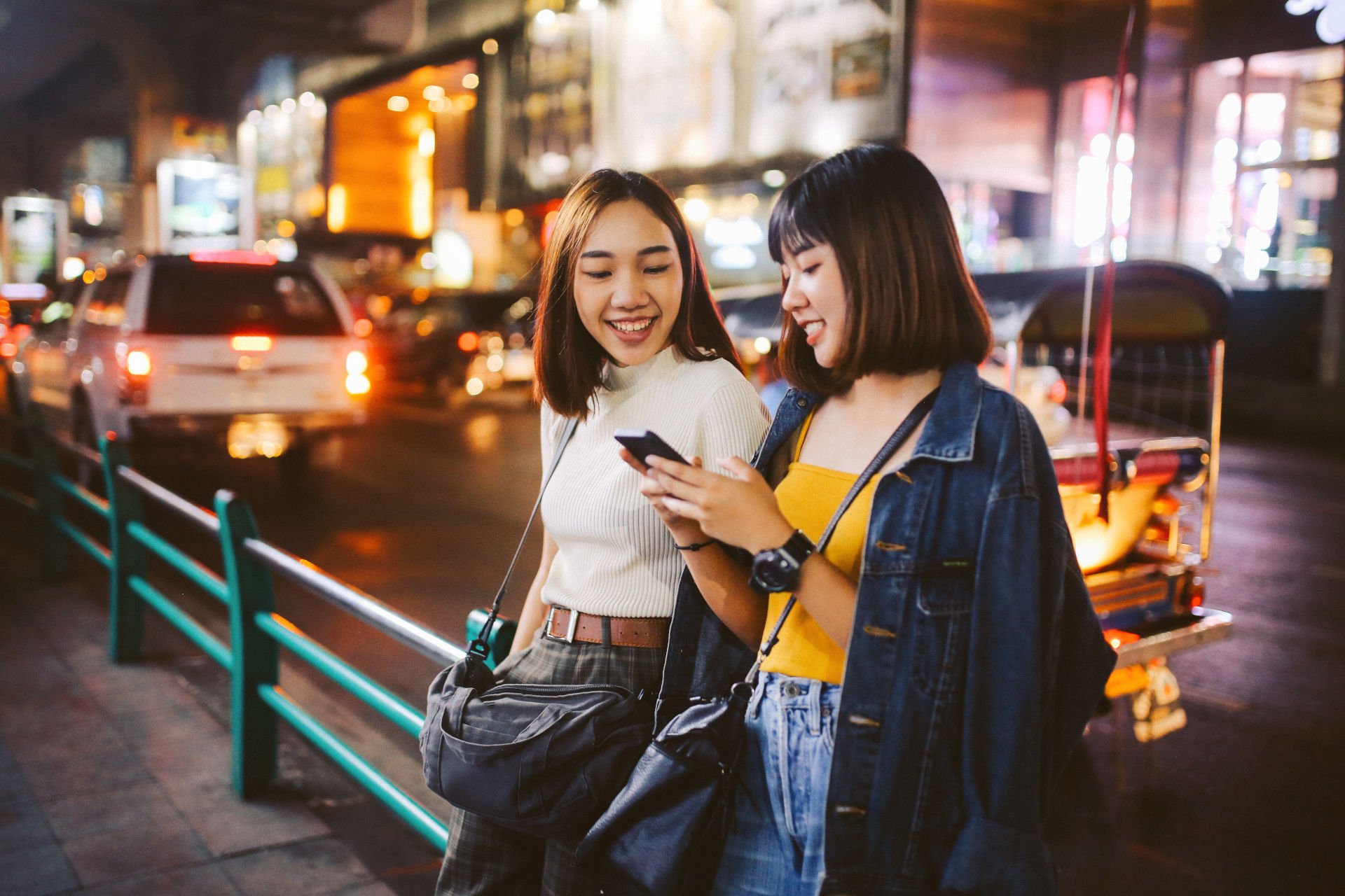 ais-case-study-two-women-phone-thailand