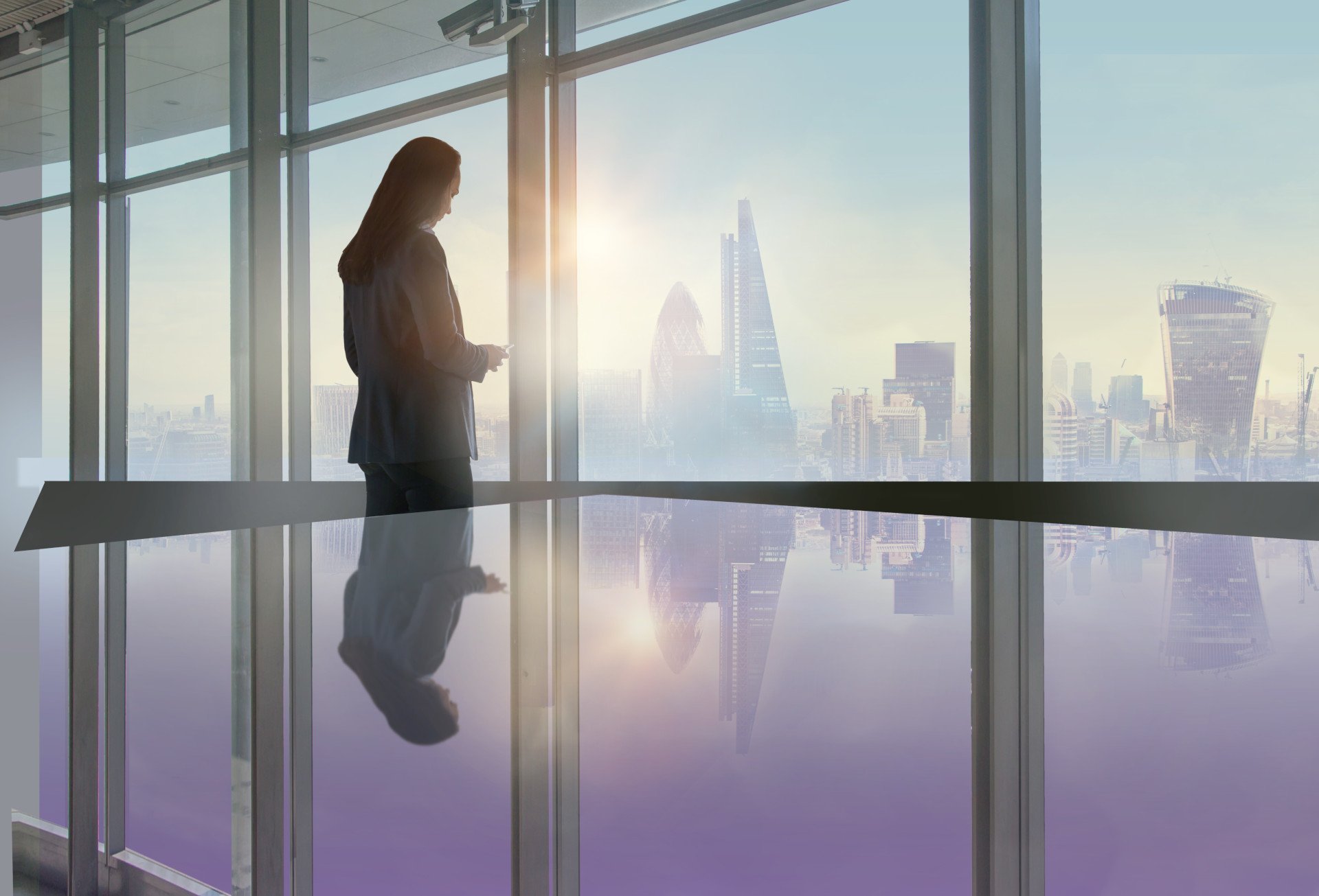 business-women-phone-office-london-sunrise-sunset-24seven