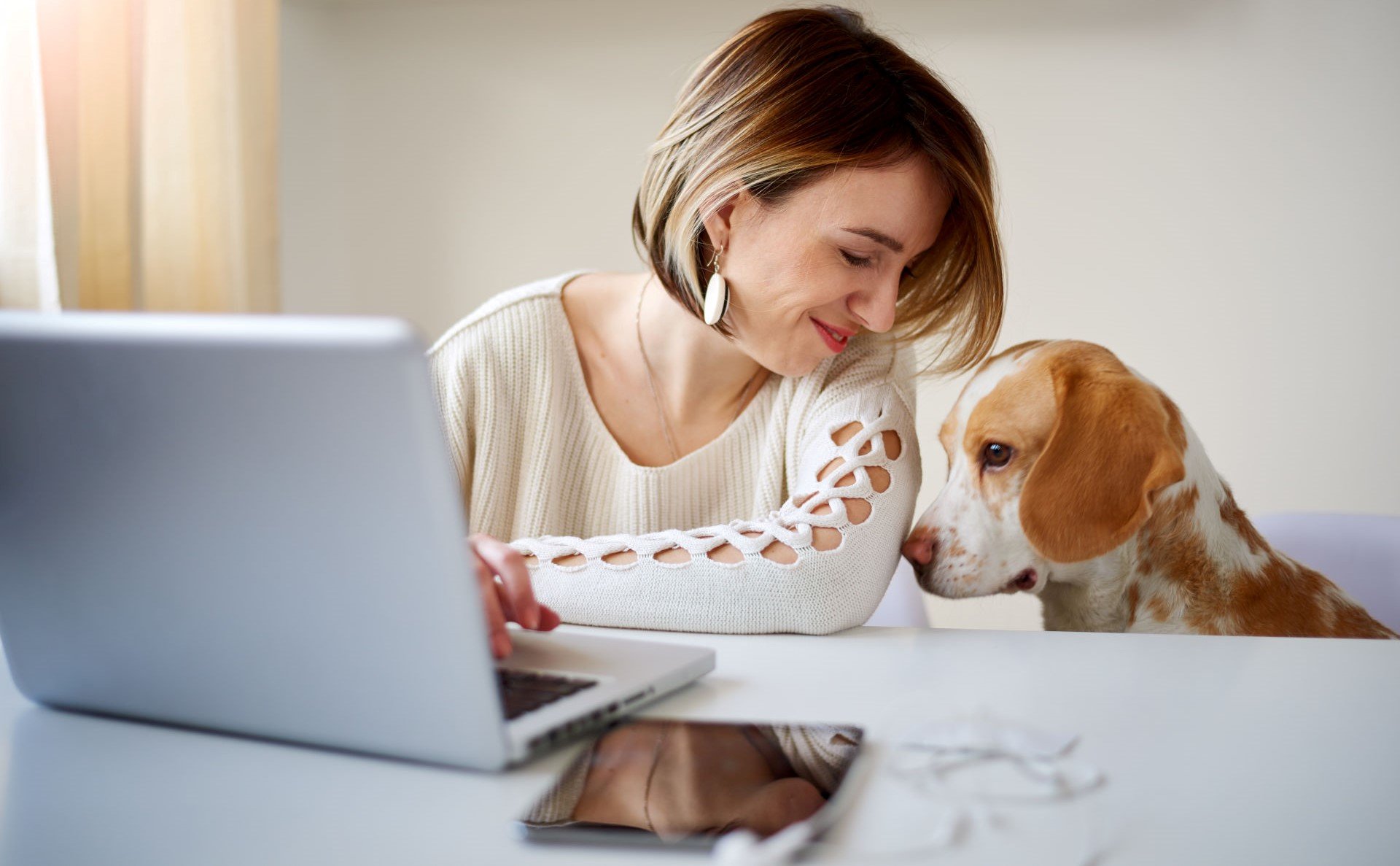 woman-working-from-home-with-dog